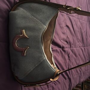 Blue Shoulder Bag with Gold Accents